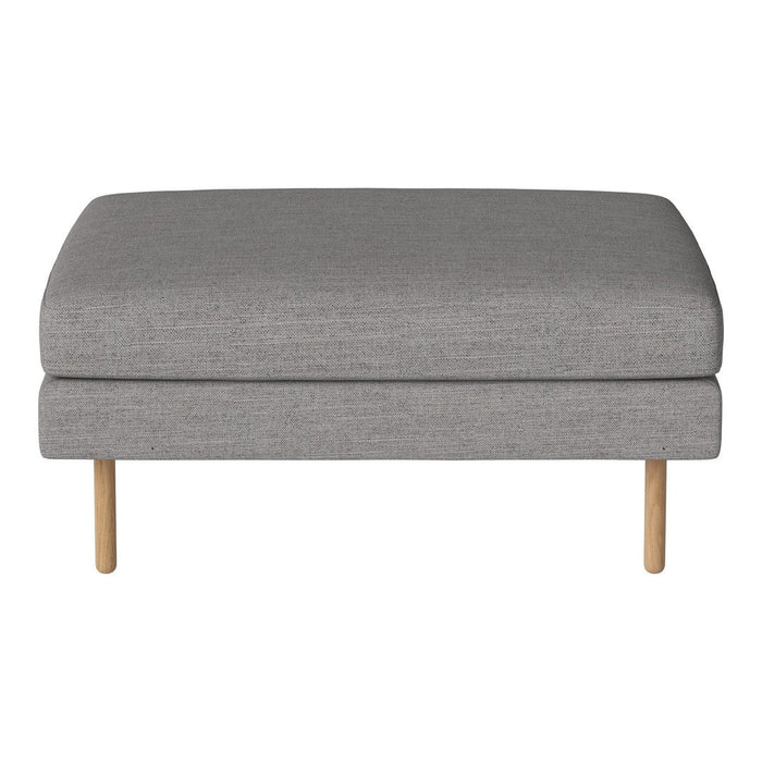 Gray fabric ottoman with a smooth texture and natural wooden legs, ideal for modern living spaces.