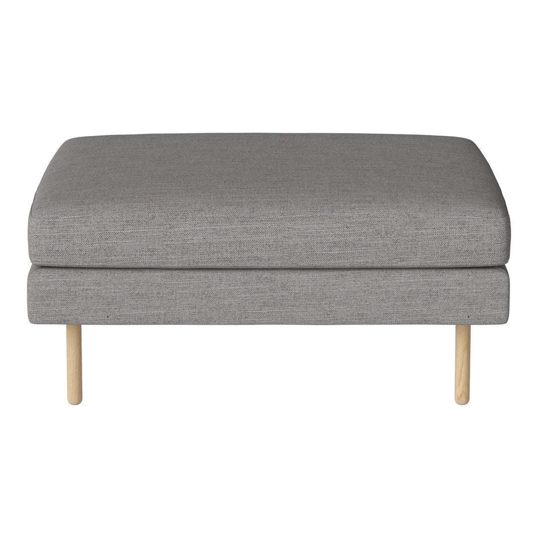 Gray upholstered ottoman with smooth fabric and natural wood legs, minimalistic design for modern decor.