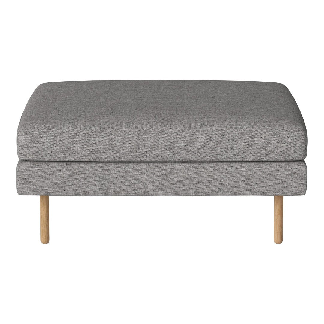 Gray upholstered ottoman with a smooth texture, featuring natural wooden legs for a modern look.