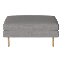 Gray upholstered ottoman with a smooth texture, featuring natural wooden legs for a modern look.