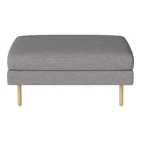 Gray upholstered ottoman with a smooth texture and light wooden legs. Versatile and modern design for any space.