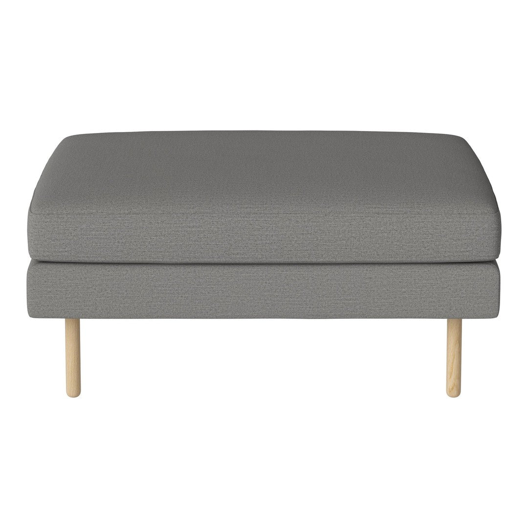 Gray upholstered ottoman with a textured pattern and light wood legs, perfect for modern decor.