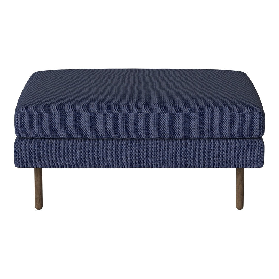 Navy blue upholstered ottoman with a textured pattern and sleek golden legs. Ideal for modern living spaces.