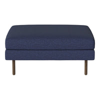 Navy blue upholstered ottoman with a textured pattern and sleek golden legs. Ideal for modern living spaces.