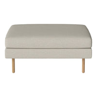 Beige upholstered ottoman with a smooth texture and natural wood legs. Perfect for modern living spaces.