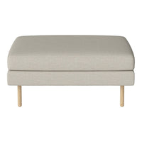 Light beige ottoman with a smooth, simple design and natural wood legs, perfect for any decor style.