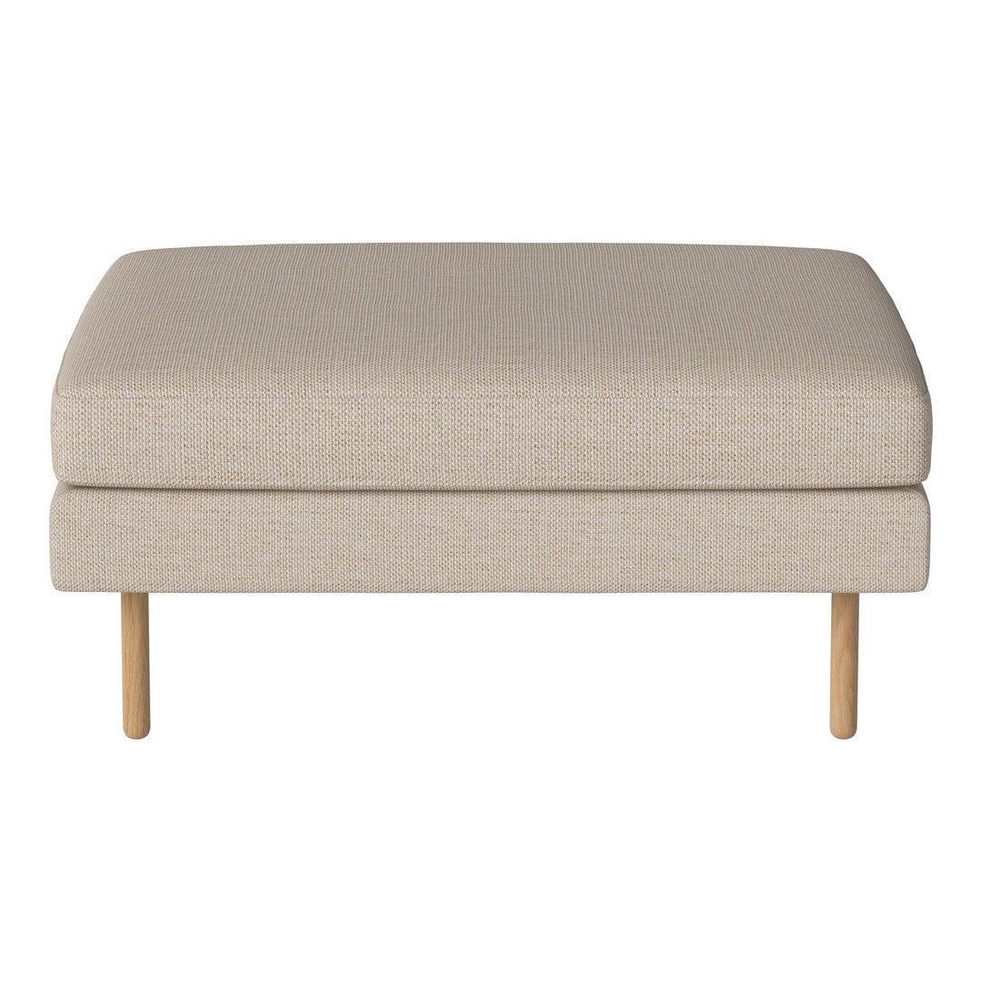 Beige upholstered ottoman with a smooth texture and light wooden legs, perfect for modern decor.