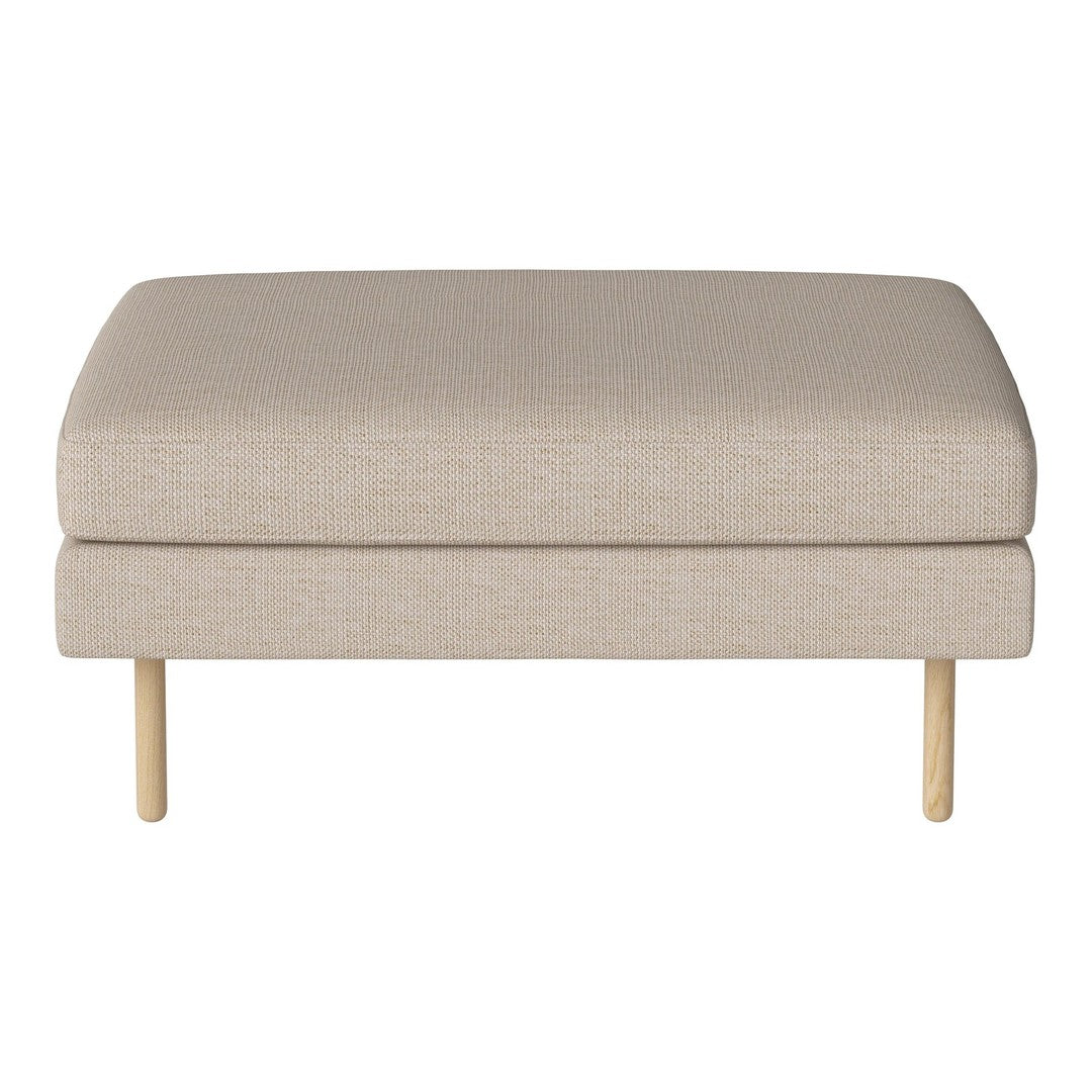 Beige upholstered ottoman with a smooth texture and light wood legs, offering a minimalist and modern design.