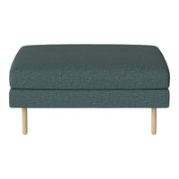 Teal upholstered ottoman with a textured pattern and natural wooden legs, perfect for modern decor.