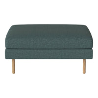 Teal upholstered ottoman with textured fabric, featuring natural wood legs for a modern look.