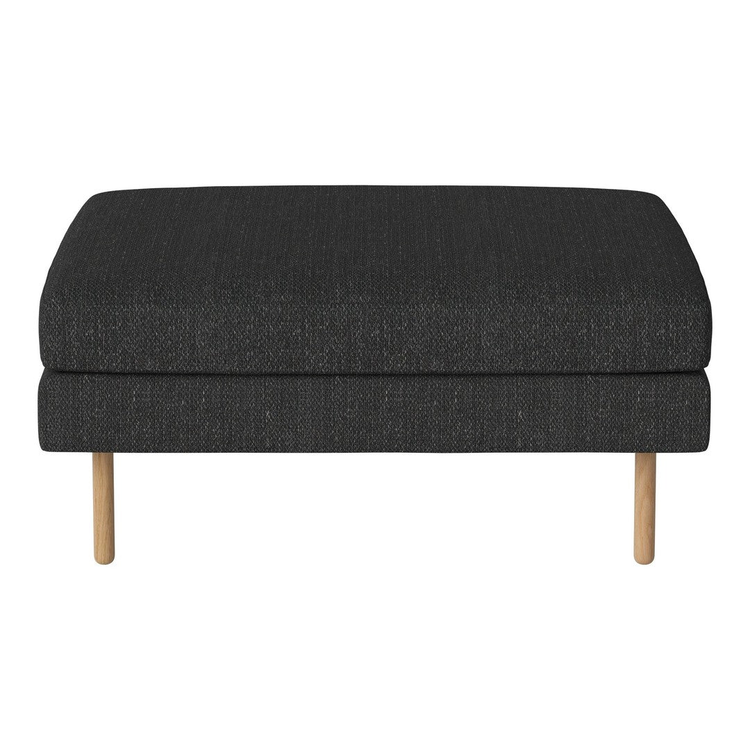 Dark gray upholstered ottoman with a smooth texture and natural wood legs, perfect for modern decor.