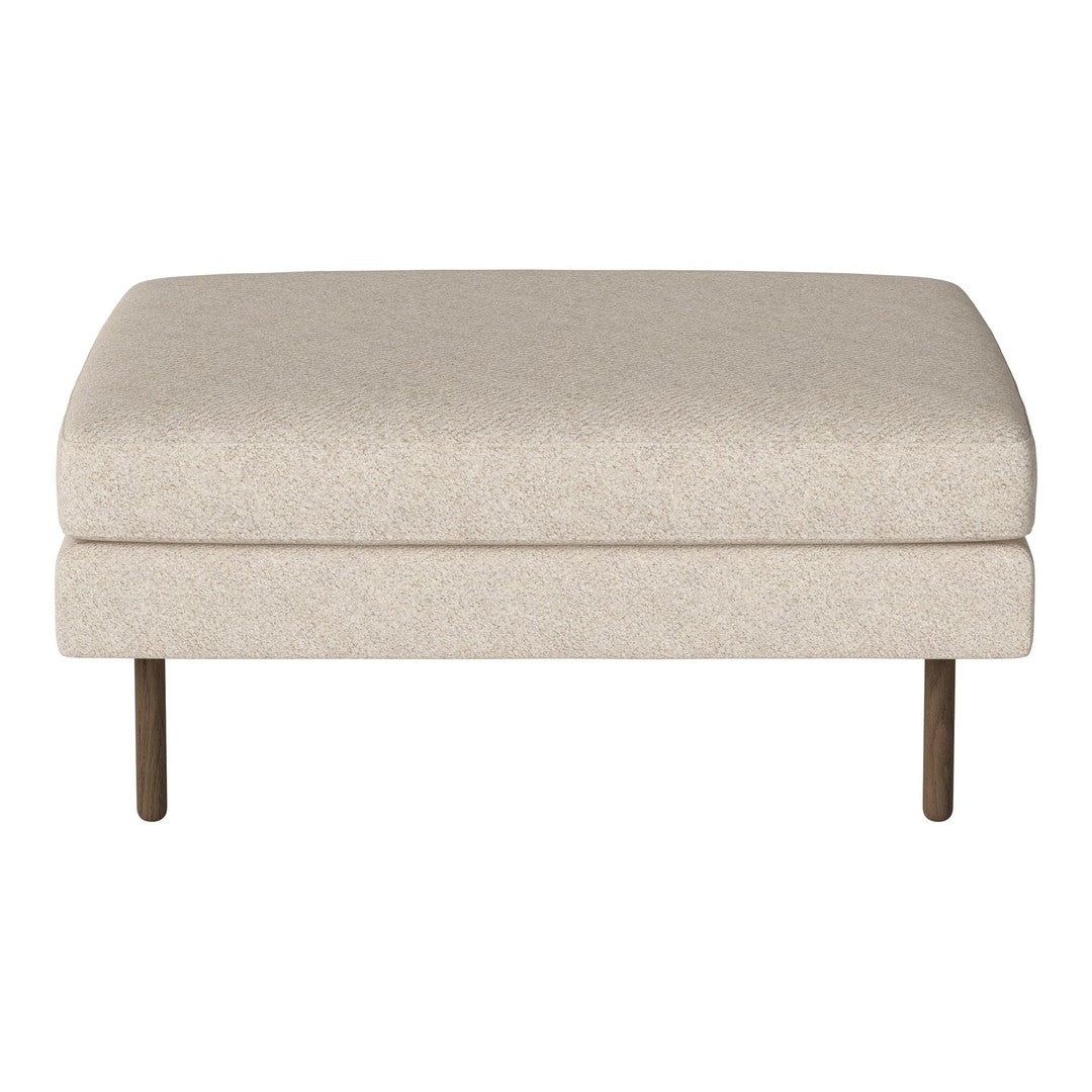 Beige upholstered ottoman with subtle texture and sleek metal legs, perfect for modern home decor.