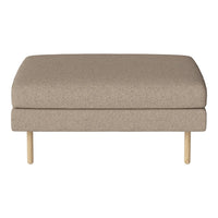 Beige upholstered ottoman with a smooth, minimalist design and natural wooden legs.