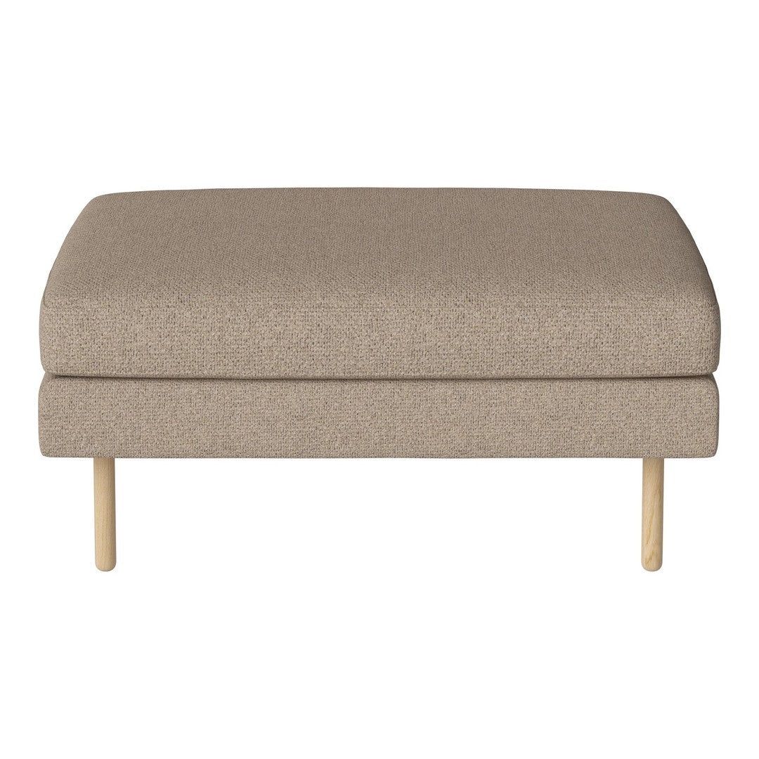 Beige upholstered ottoman with a smooth texture and light wooden legs, perfect for modern decor.