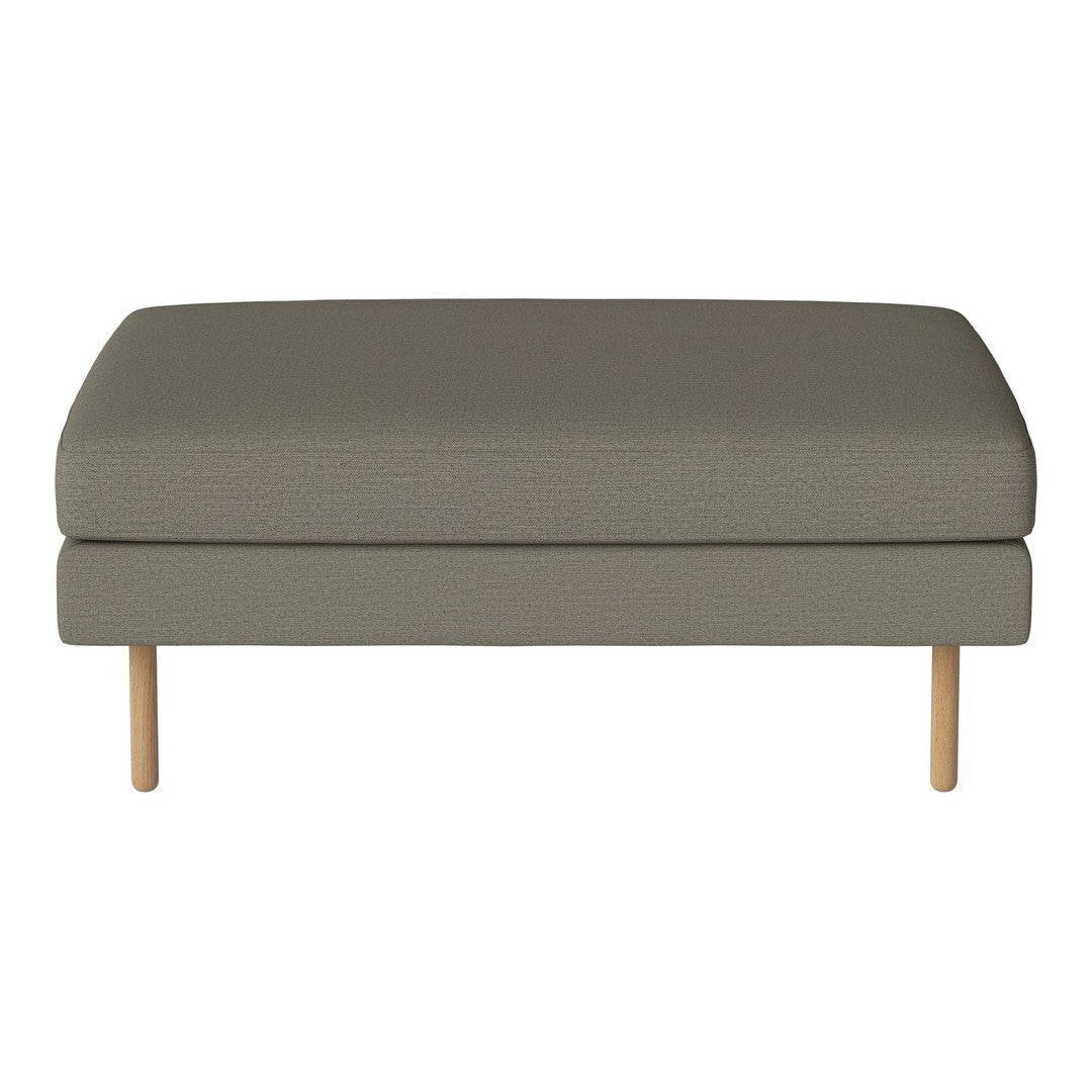 Gray upholstered ottoman with textured pattern and light wooden legs. Modern design for versatile decor.