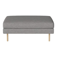 Gray upholstered ottoman with a smooth texture and light wood legs, featuring a minimalist design.