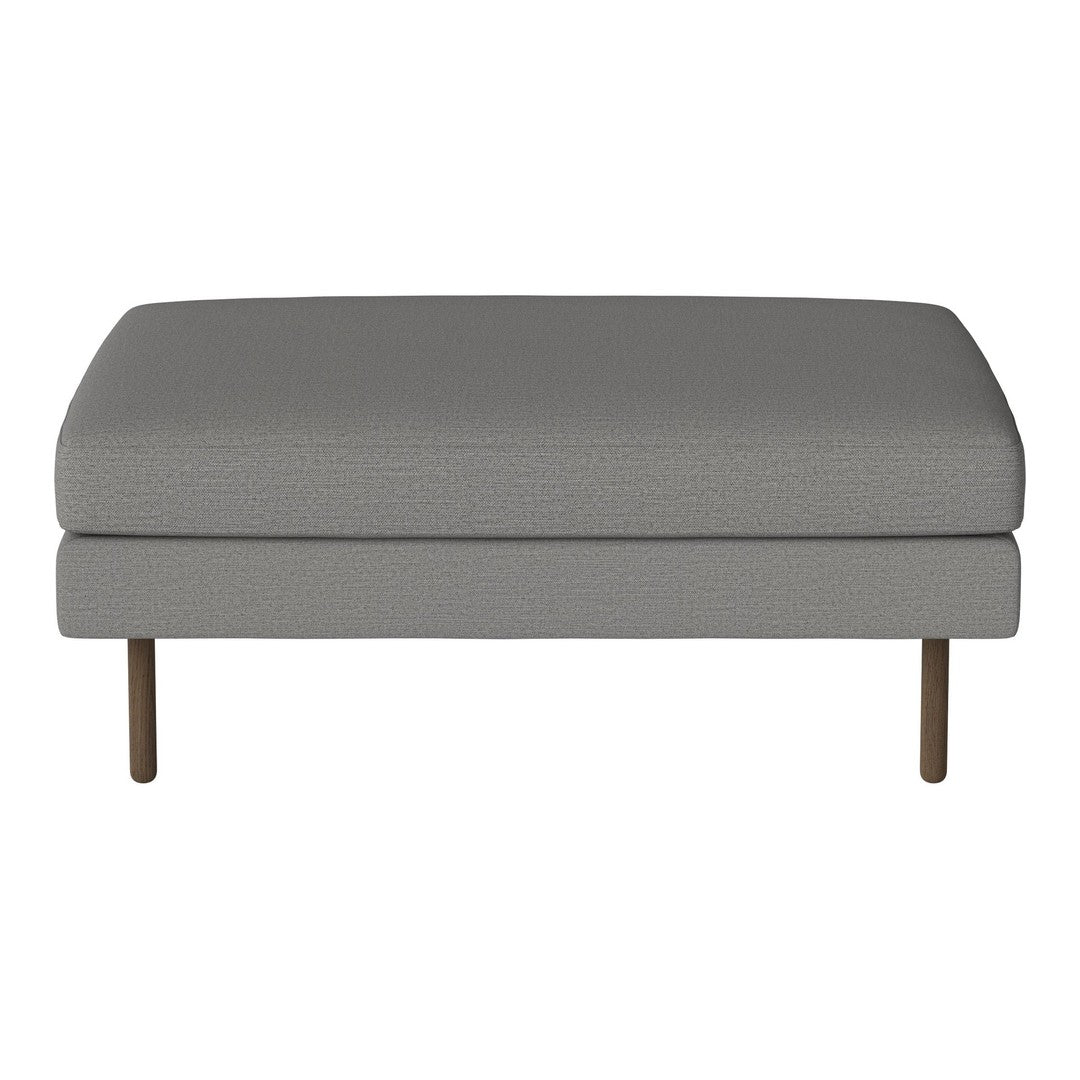 Gray upholstered ottoman with a sleek, minimalist design and subtle textured pattern. Stylish metal legs.