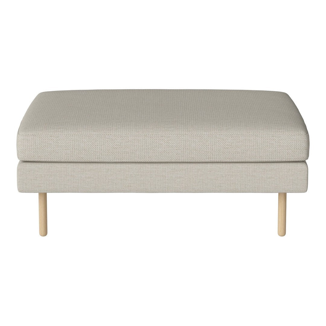 Light gray upholstered ottoman with a smooth texture and natural wood legs. Simple and modern design.