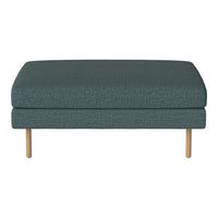 Teal fabric ottoman with textured surface and light wood legs, featuring a modern minimalist design.