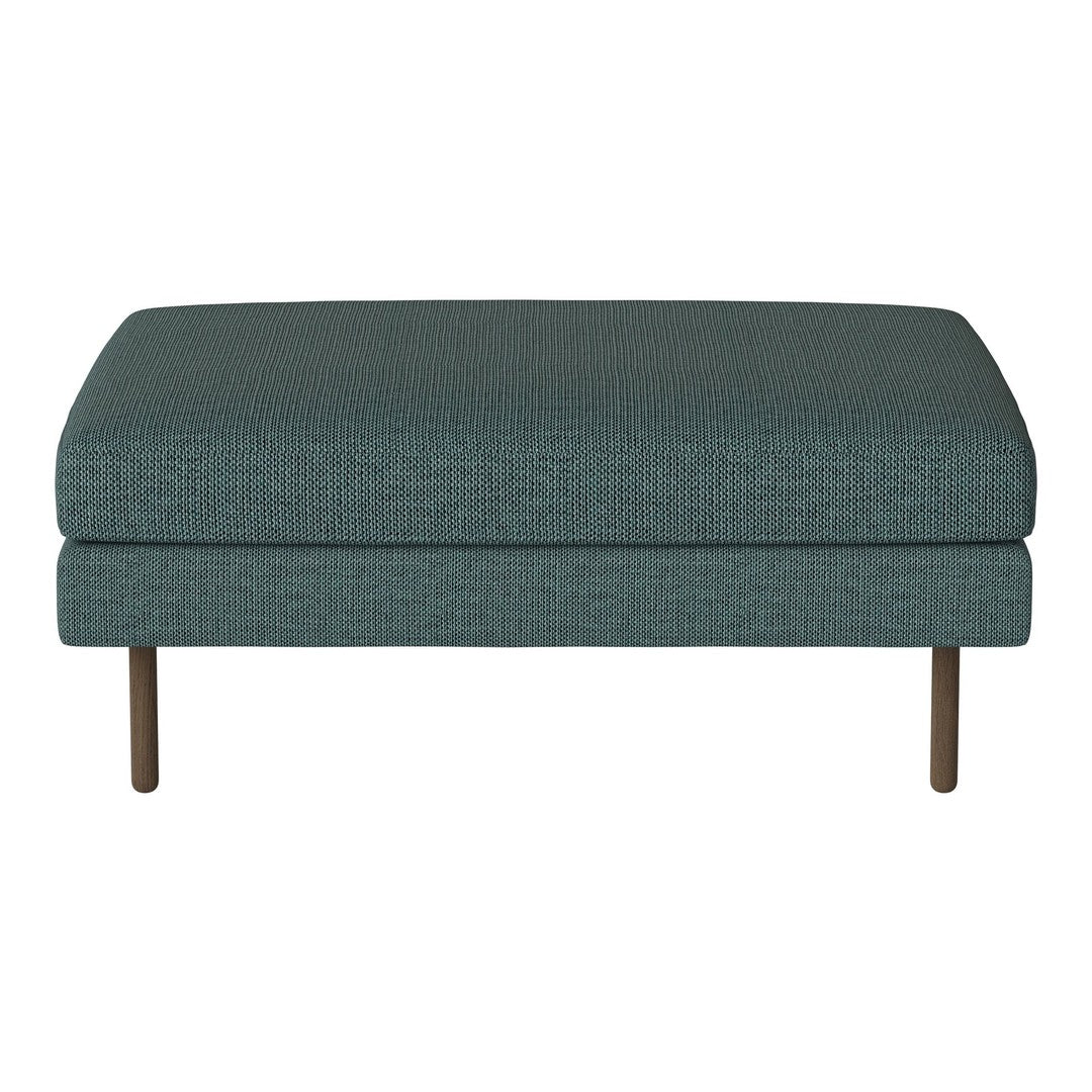 Teal upholstered ottoman with a textured pattern and wooden legs, perfect for modern decor.