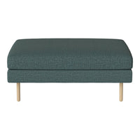 Teal upholstered ottoman with subtle texture and light wood legs, perfect for modern decor.