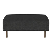 Gray textured ottoman with a sleek design and subtle pattern, featuring slender metallic legs.