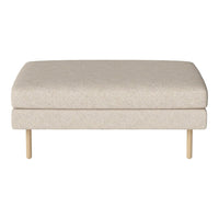 Beige upholstered ottoman with subtle texture, featuring wooden legs for a modern, minimalist look.