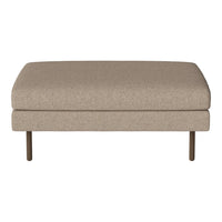 Beige upholstered ottoman with a smooth texture and minimalist design, featuring sleek metal legs.