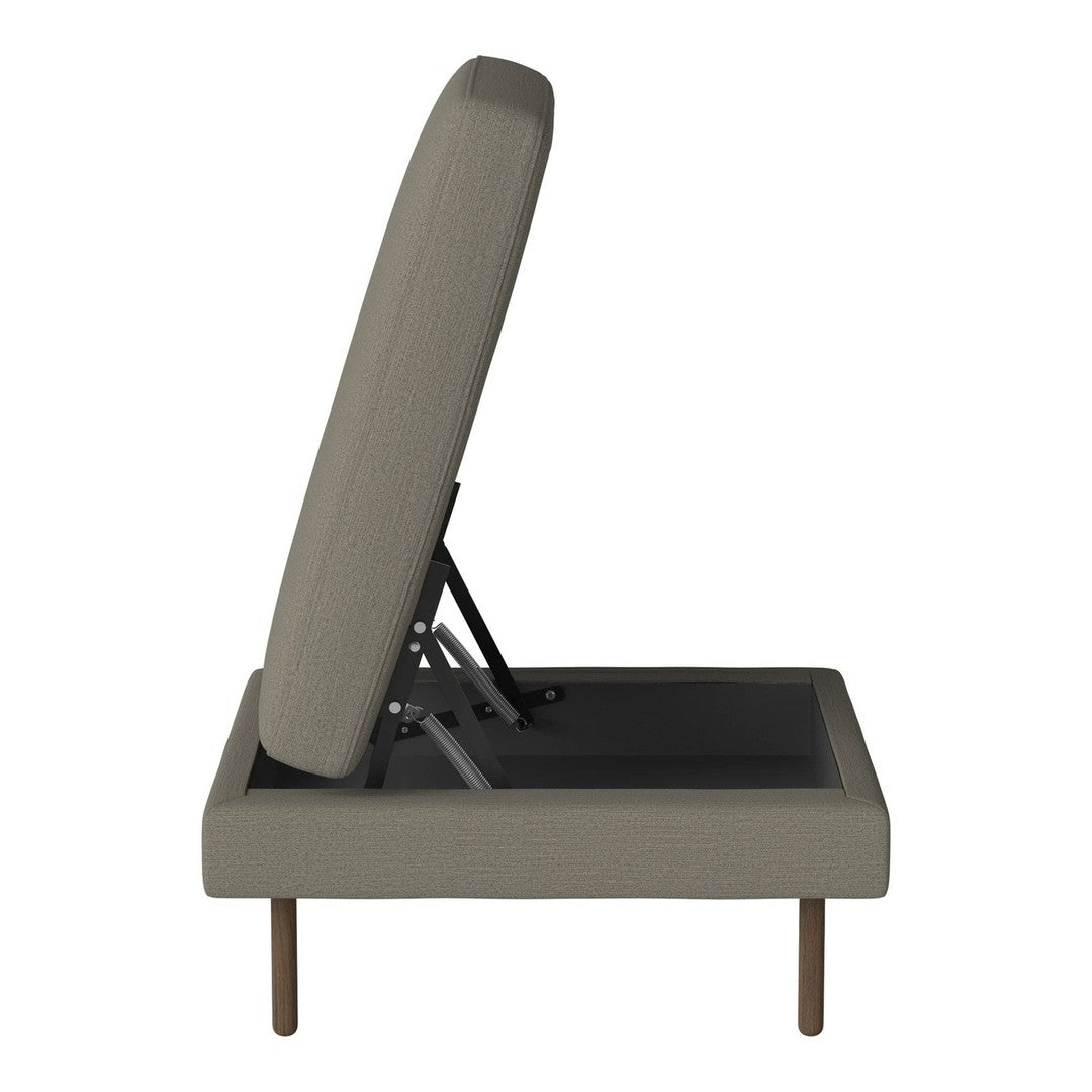 Olive green upholstery with a textured pattern, complemented by wooden legs in a minimalist design.