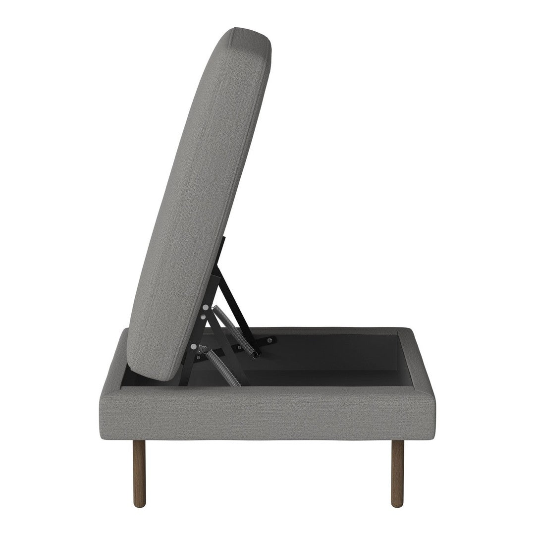 Gray upholstered sofa bed with clean lines and a modern design, featuring a textured surface and minimalist wooden legs.