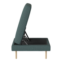 Green textured fabric lounge chair with a sleek design and natural wood legs. Modern and stylish home decor.