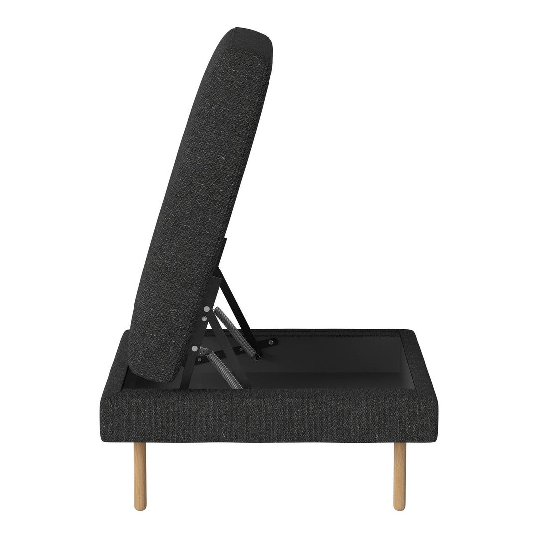 Stylish black fabric lounge chair with a textured pattern and natural wooden legs. Modern and versatile design.