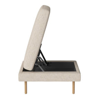 Beige upholstered storage bench with a minimalist design and subtle fabric texture, featuring wooden legs and a sleek black interior.