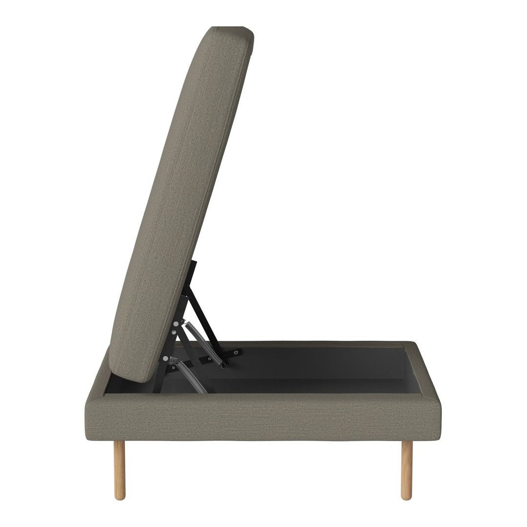 Gray upholstered adjustable bed frame with a sleek design and wooden legs, showcasing a minimalist modern pattern.