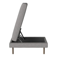 Gray fabric chaise lounge with sleek lines and modern design. Perfect addition to any contemporary space.