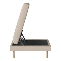 Beige upholstered bed frame with simple, modern lines and natural wooden legs, featuring a sleek, black base.