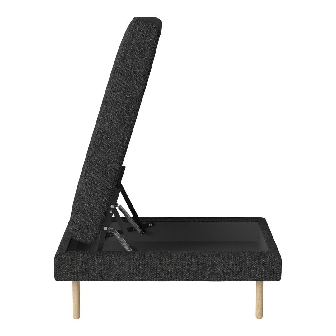 Adjustable black fabric lounge chair with a minimalist design and natural wood legs. Perfect for modern interiors.
