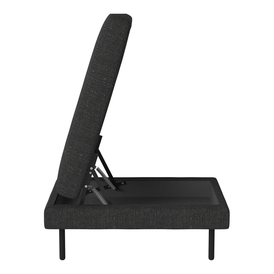 Side view of a black adjustable folding chair with a textured fabric pattern and sleek metal legs.