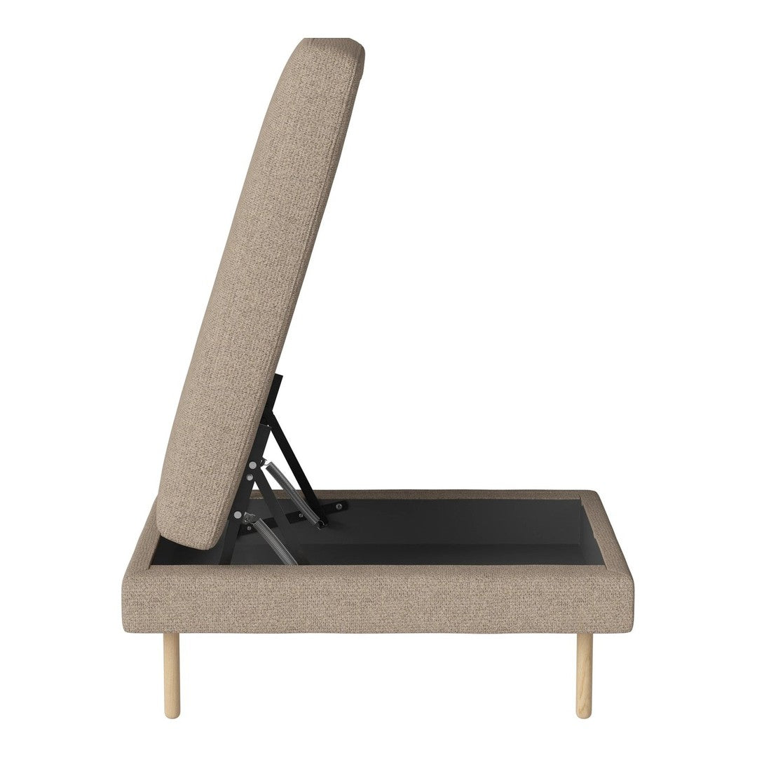 Beige upholstered bed frame with wooden legs and a patterned fabric headboard, partially reclined for versatility.