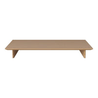 Light beige raised tabletop with smooth, minimalist design; ideal for modern decor accents.