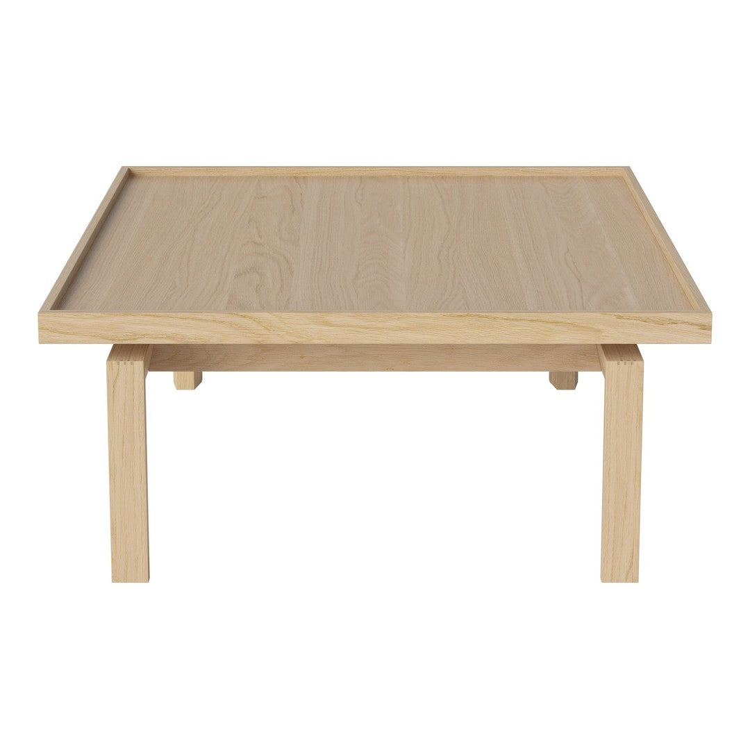 Light oak coffee table with a smooth, natural wood grain and minimalist design.
