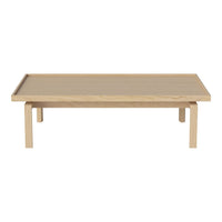 Light oak coffee table with a smooth, minimalist design and natural wood grain pattern. Perfect for modern decor.