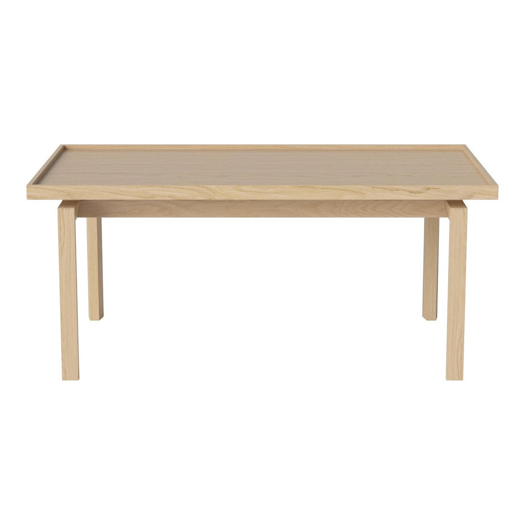 Natural wood finish dining table in light beige with a smooth, simple design. Ideal for modern home decor.
