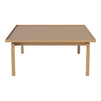 Light oak coffee table with a smooth, natural wood finish and minimalist design, showcasing clean lines and a simple aesthetic.