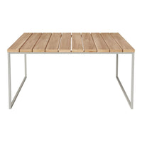 Neutral wooden slat tabletop with natural grain pattern, supported by a sleek silver metal frame.