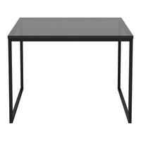 Black metal frame with a sleek, smooth gray glass tabletop, perfect for modern decor.