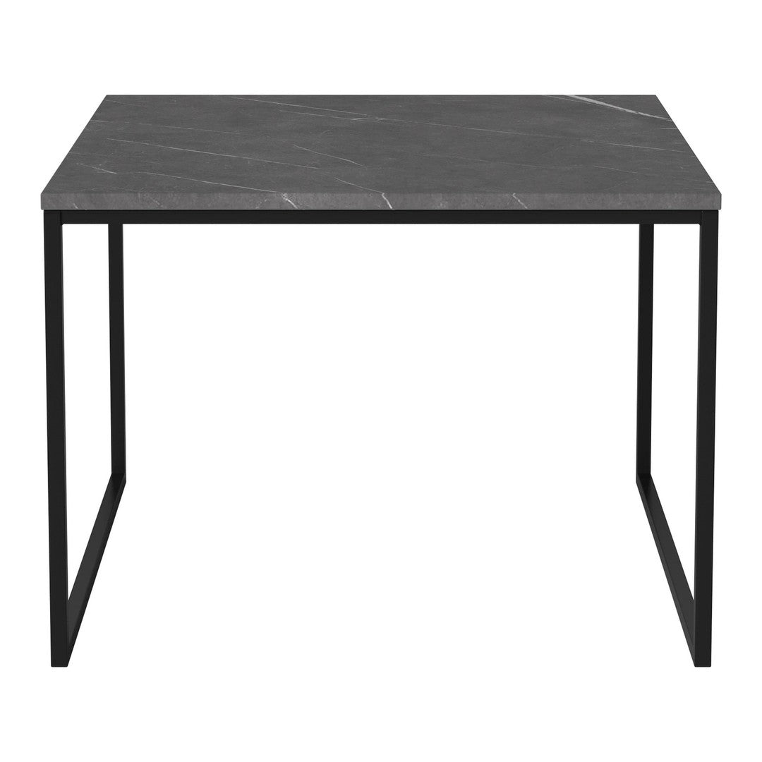 Black marble table with white veining on a sleek black metal frame. Modern and minimalistic design.