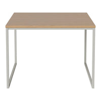 Light wood tabletop with a smooth finish and sleek metal legs in a modern design. Perfect for minimalist decor.
