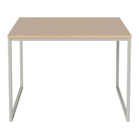Light wood tabletop with a smooth finish and a sleek silver metal frame, creating a modern minimalist design.