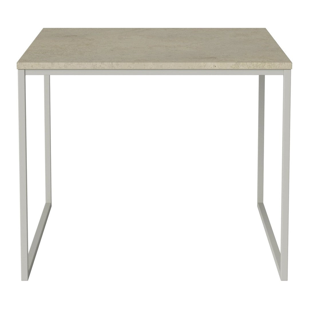 Light beige tabletop with a smooth finish, accented by a sleek silver metal frame. Minimalist design.
